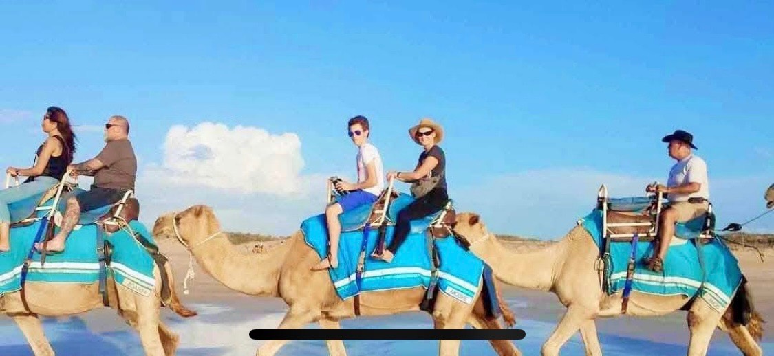 Sandboarding and camel experience